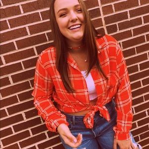 Selling this orange plaid top!